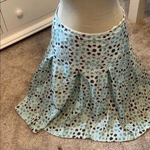 Cute teal brown color skirt.